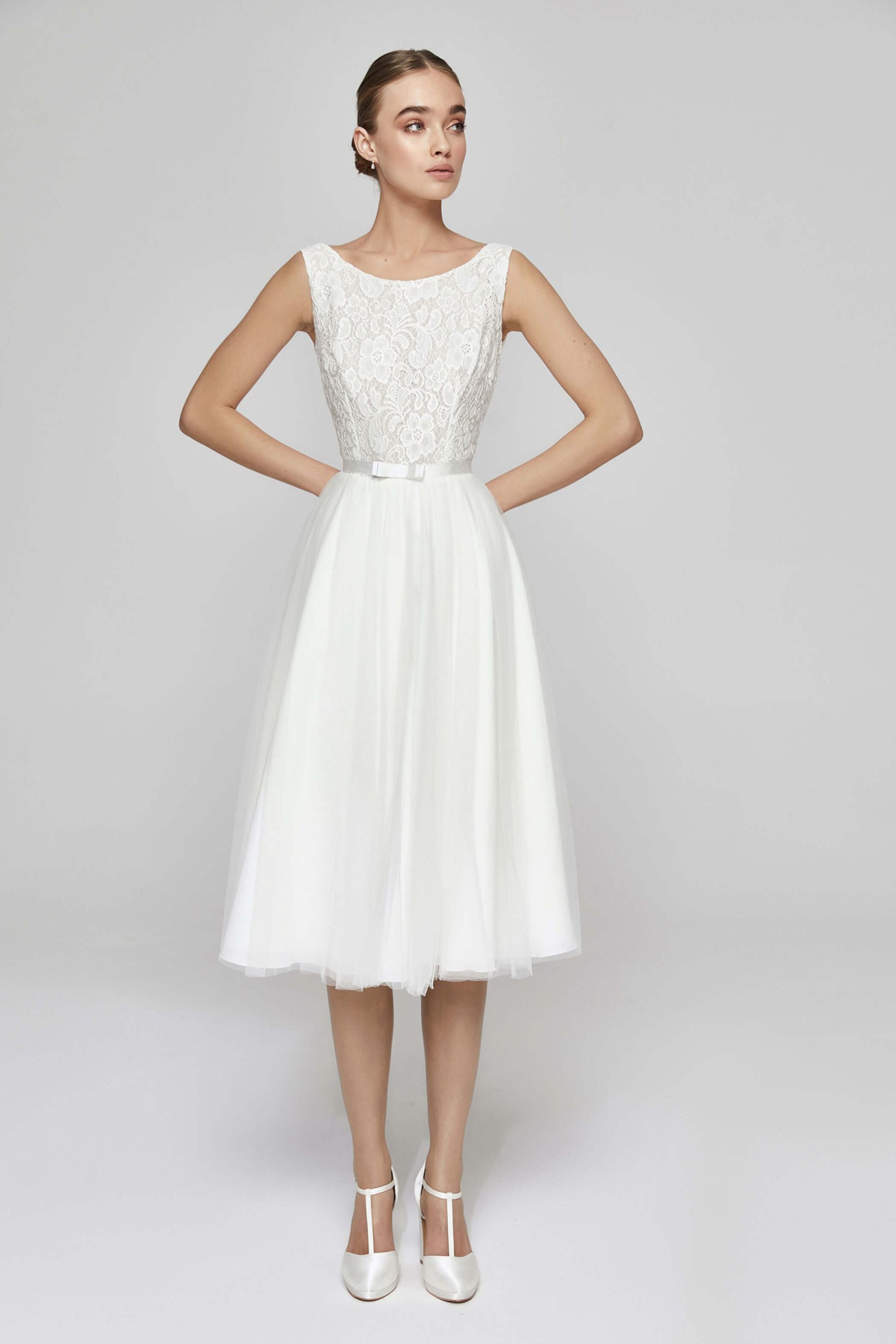 Explore short A-line boat neck lace & tulle wedding dress at Bride Now